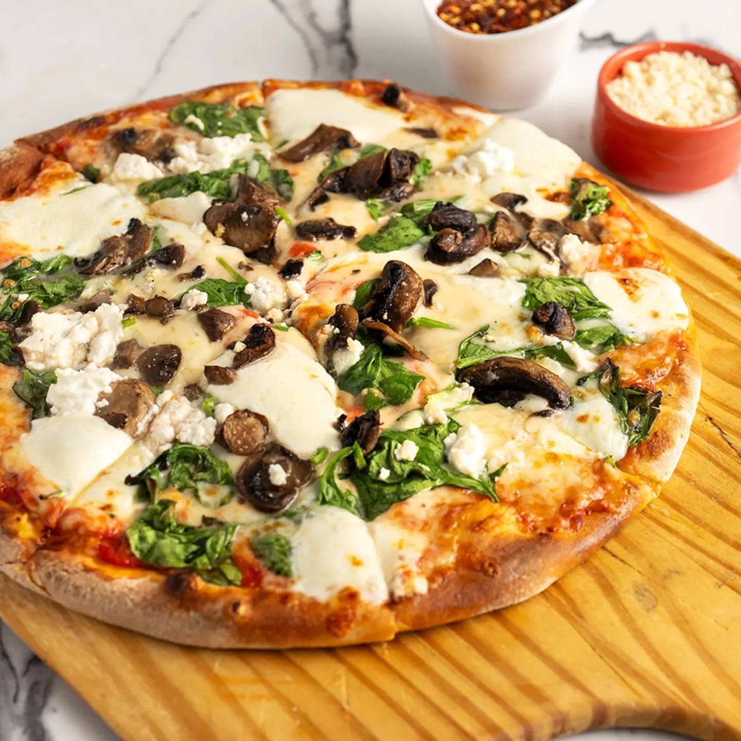 Sorrento Pizza with Spinach, mushroom, ricotta pizza at Mamale , Chalav Yisrael Kosher Café, Serving Aventura.