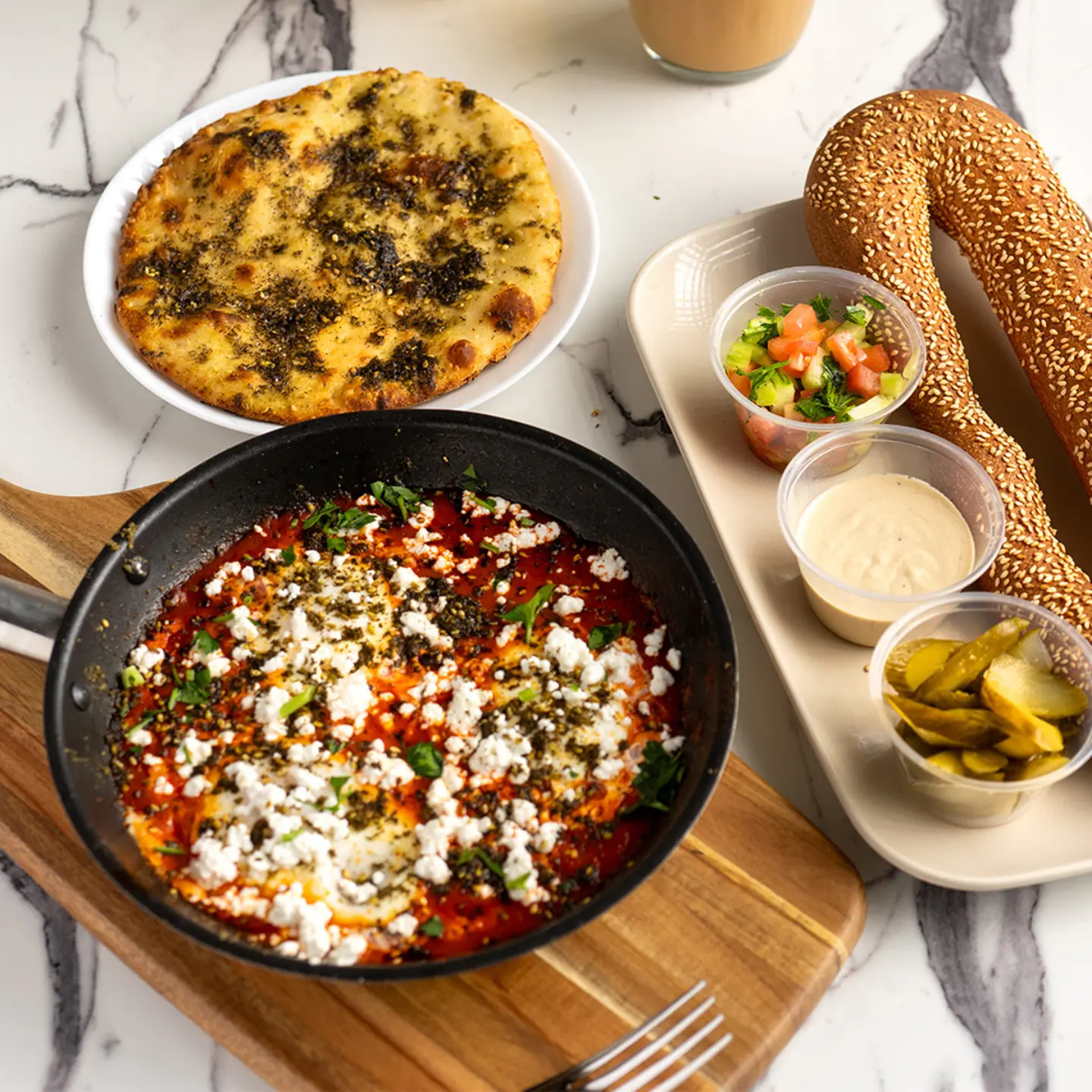 Signature Shakshuka Breakfast with feta and fresh herbs, za'atar flat bread, at Mamale, Chalav Yisrael Kosher Café